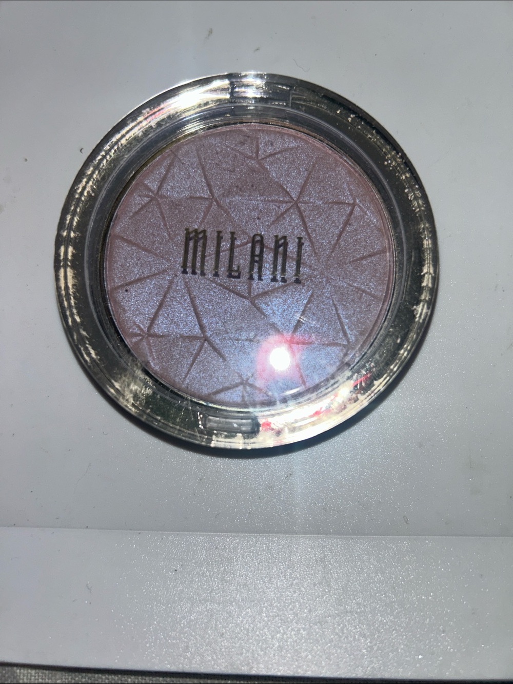 Milani Lavender Glow Baked Highlighter brand new.